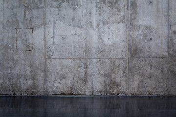 Grungy and smooth bare concrete wall