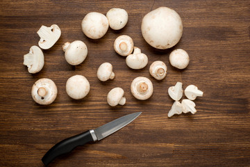 Fresh Mushroom on wooden background.