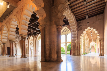 Arches and rooms of the Nord Porch within the Aljaferia Palace a - obrazy, fototapety, plakaty