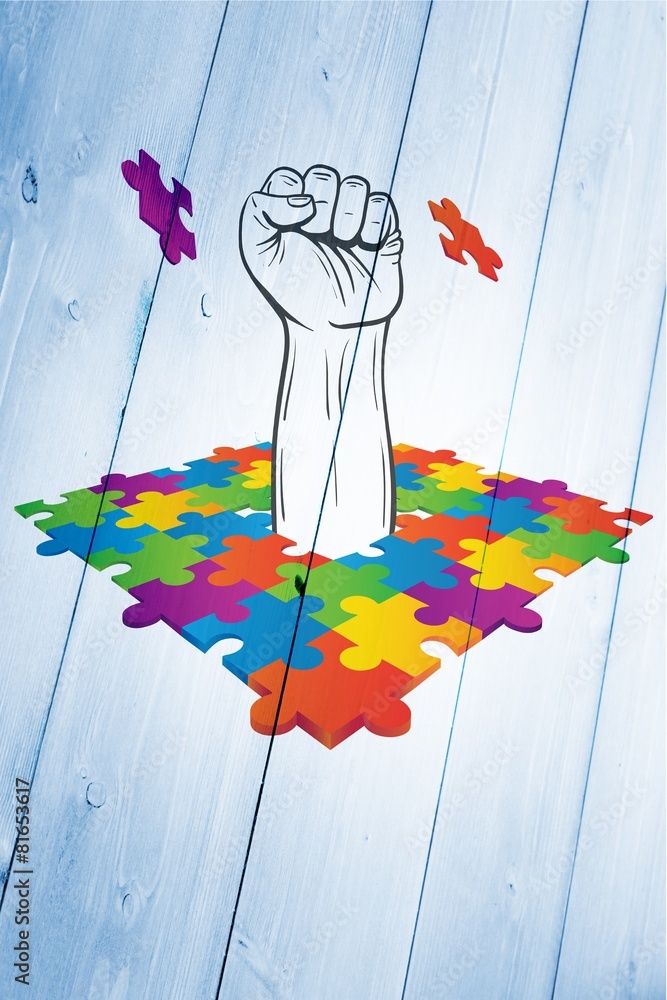 Poster Composite image of hand punching through jigsaw