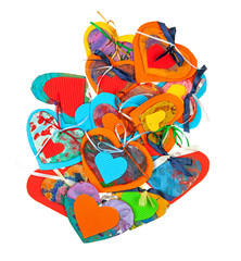 Pile of color paper hearts over white