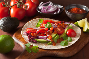 vegan taco with vegetable, kidey beans and salsa
