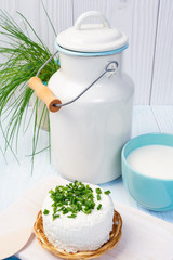 mug with milk on vintage table