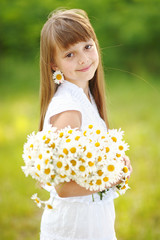 portrait of little girl outdoors in summer