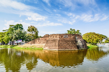 Fototapeta na wymiar Historical fortress and ancient wall in chiang mai, landmark of