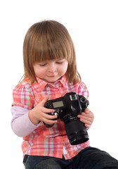 Two-year-girl and still camera