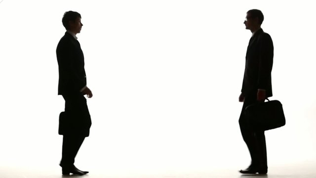 Business meeting with Casey, shaking hands. Slow motion