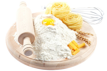 Baking ingredients for cooking on white background.