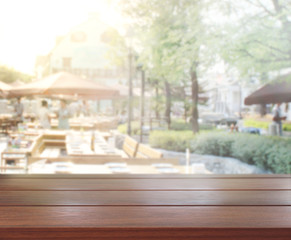 Table Top And Blur Building Background