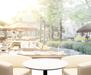 Table Top And Blur Building Background
