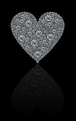 Round diamonds heart isolated on a black background