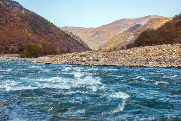 Fototapeta na wymiar autumn landscape mountain river North Caucasus