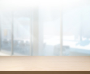 Fototapeta premium Table Top And Blur Office Background
