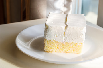 butter cake with cream on top