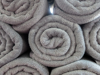 Rolled Up Gray Spa Towel used as Background