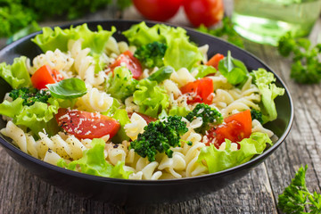 Pasta salad with cherry tomatoes and broccoli