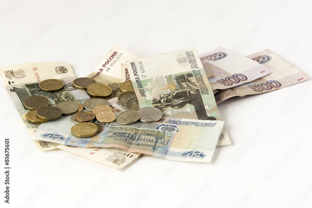 Wall mural Some modern russian banknotes and coins on a white background