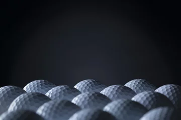 Papier Peint photo Golf Groupe de balles de golf isolé sur fond noir.