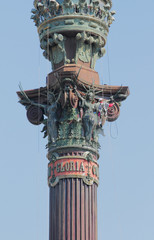 Rock-climber on monument. Barcelona, Spain