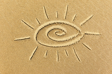 image of the sun on the sand