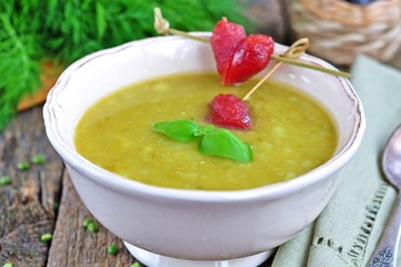 Appetizing pea soup with bacon and sausage