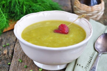 Appetizing pea soup with bacon and sausage