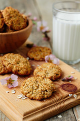 Homemade oatmeal cookies and a glass of milk