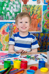 Little Boy Painting