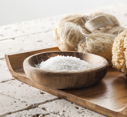 bath salt on wooden tray for spa treatment