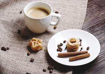 Cup of coffee on a wooden table