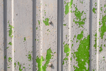 chipped paint on сorrugated metal siding texture
