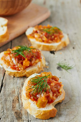 Vegetable caviar on a slice of baguette