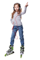 Little girl with earphones in roller skates pointed up