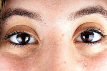 Naklejka premium Close up of the face of a young lady