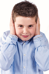child covering his ears