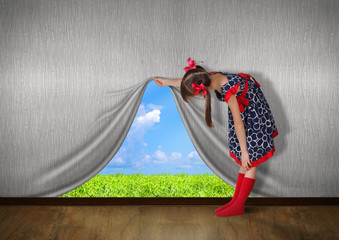Child raise the wall and look on nature,