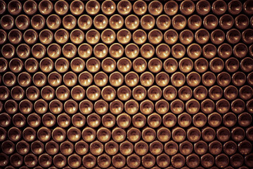 Old wine bottles stacked for aging