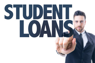 Business man pointing the text: Student Loans