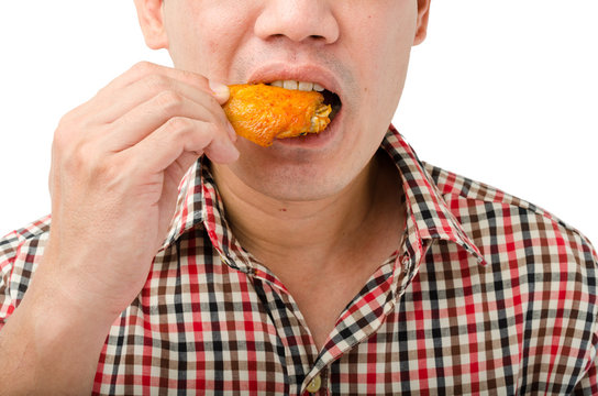 Man Eating Chicken Wing