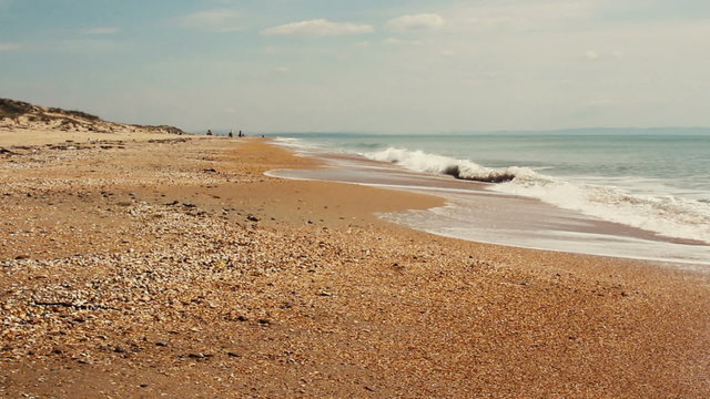 beautiful sea view with light waves in sunny spring morning