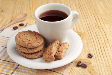 Oatmeal cookies and coffee cup