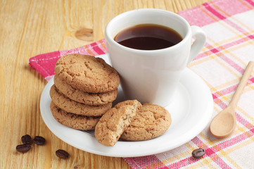 Plate with coffee and oatmeal cookies
