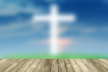 Abstract Jesus on the cross blue sky with wooden paving.