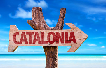 Catalonia wooden sign with beach background