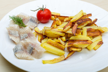 Roasted potato with herring fillet