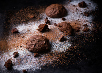 Homemade chocolate cookies on dark background
