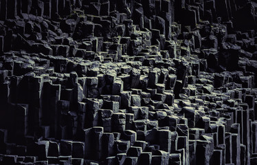 The black sand beach with typical rock formation in Iceland