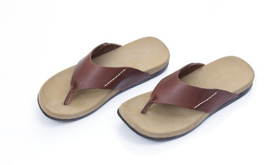Brown leather slipper isolated on white background