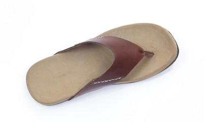 Brown leather slipper isolated on white background