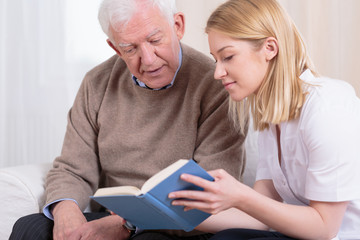 Senior man and caregiver
